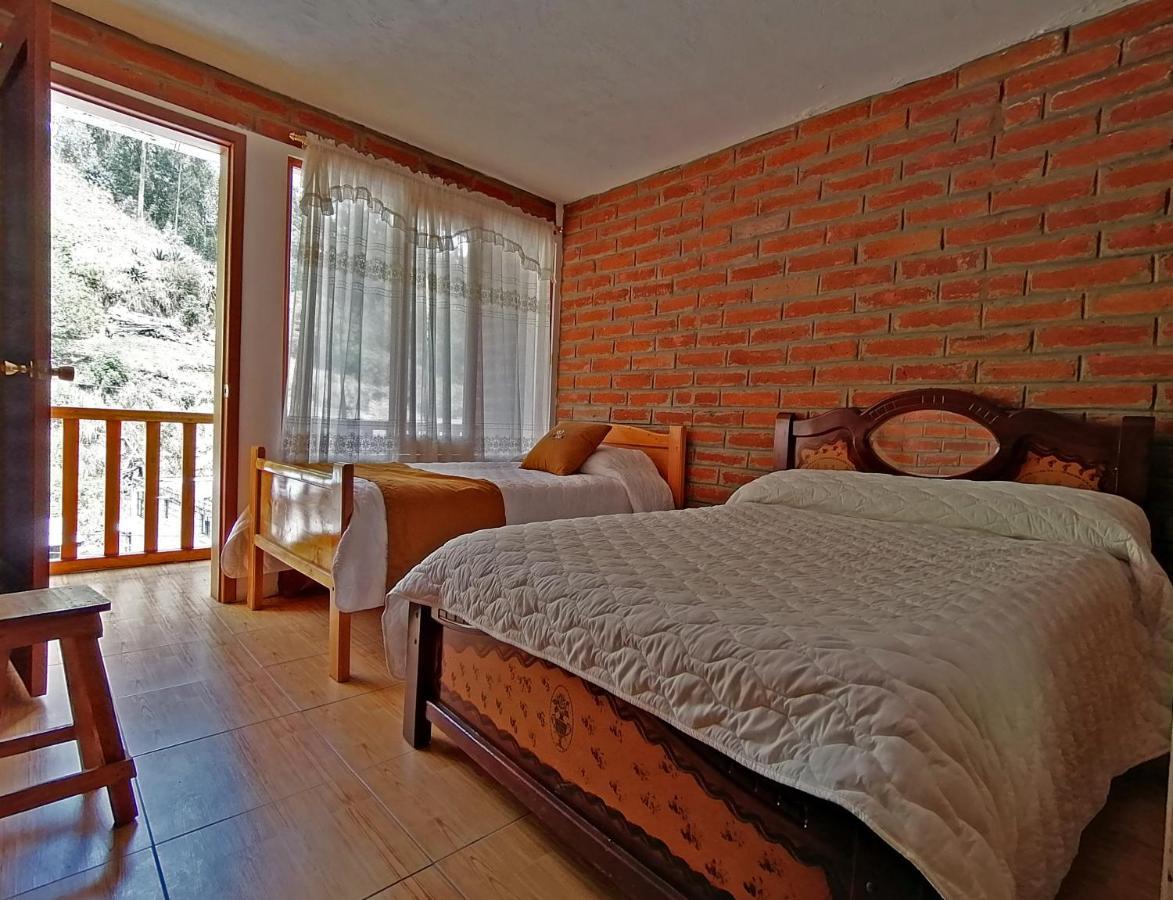 Lagoon Hotel Chugchilán Exterior foto